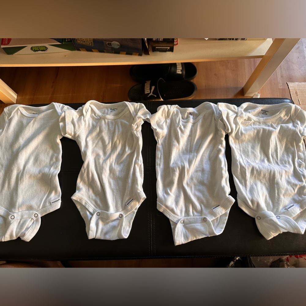 Plain white baby onsies